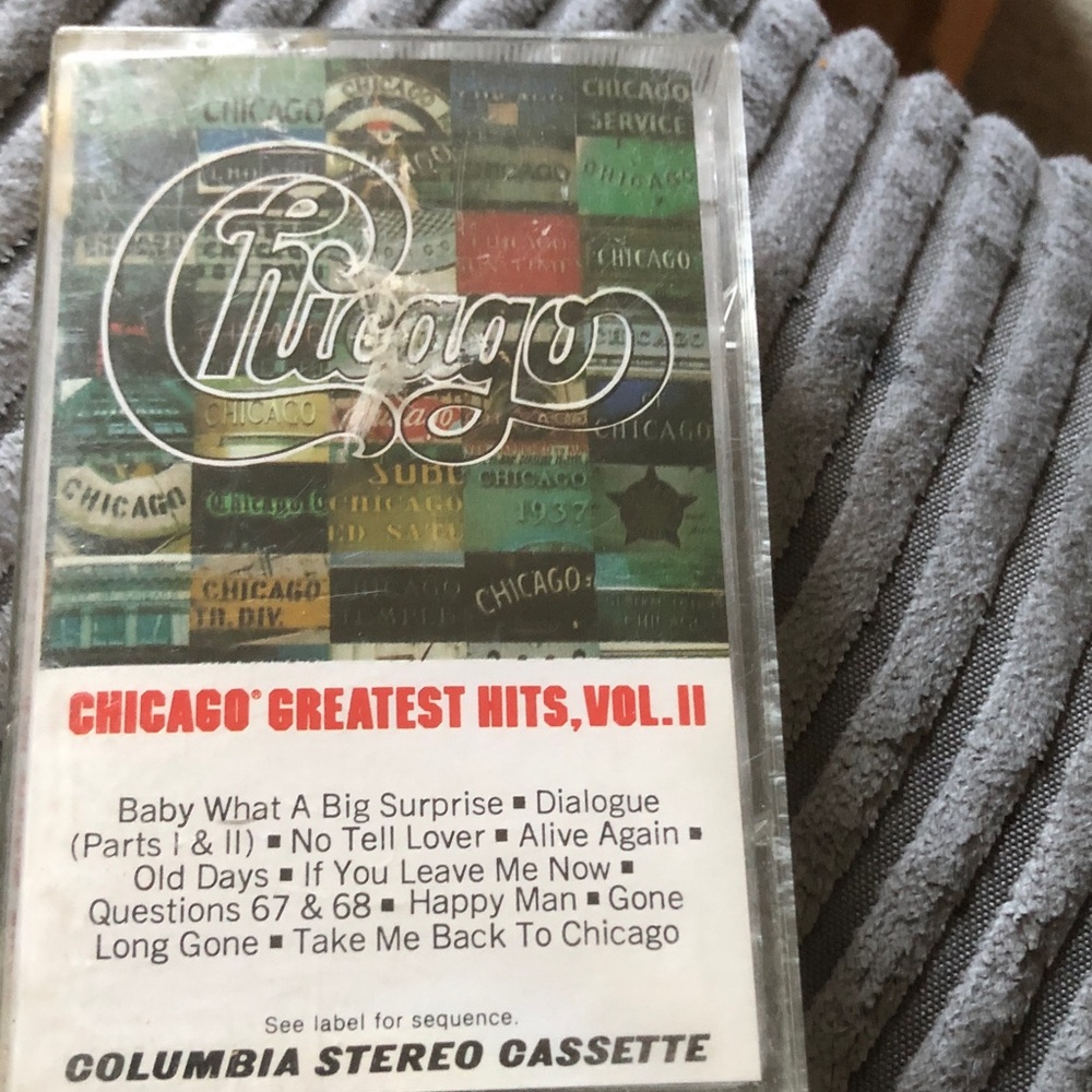 Columbia cassette with multicolor album art — green, red, black, cream